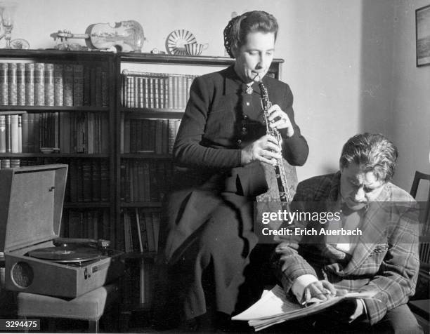British conductor and cellist Sir John Barbirolli with his wife the oboist Lady Barbirolli, nee Evelyn Rothwell .