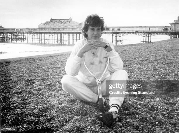 British tennis player Jo Durie relaxes on the beach at Brighton.