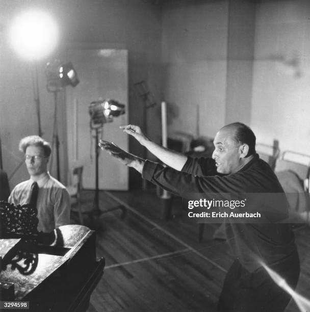 Hungarian-born British conductor Sir Georg Solti during a rehearsal of Mozart's 'The Marriage of Figaro' at the Royal Opera House, Covent Garden,...