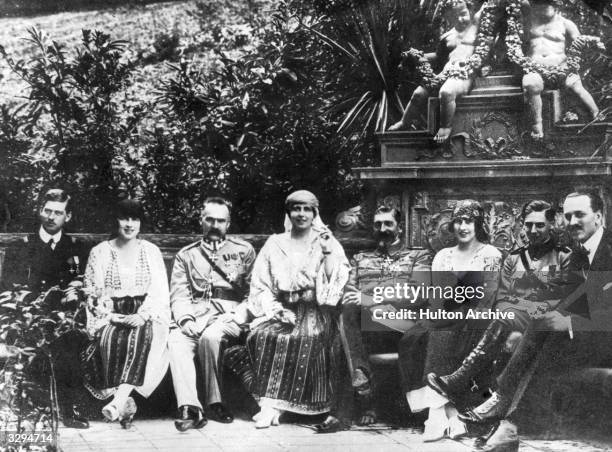 Marie, Queen of Romania relaxing with her son Crown Prince Carol , Marshal Pilsudski , Princess Irene von Grischenland and Prince Nicholas.