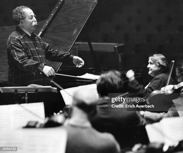 French conductor Pierre Monteux and the English pianist Dame Myra Hess .