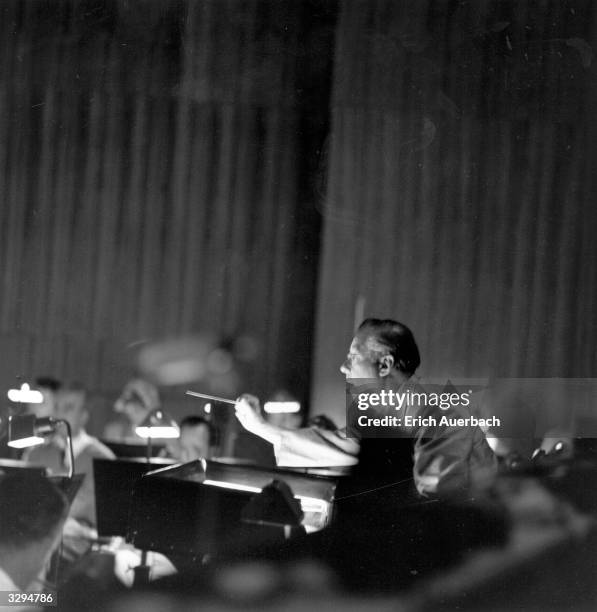 The Austrian conductor Karl Bohm , conducting in the orchestra pit at the New Festsprelhaus, at the Salzburg Festival.