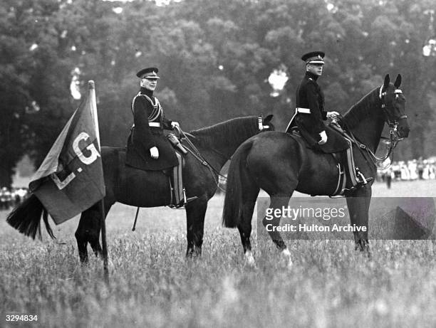 The Duke of Windsor, , as KIng Edward VIII, , at the saluting base with the Earl of Athlone during his inspection of the Life Guards in Windsor Great...