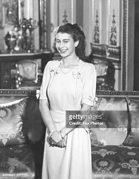 Princess Elizabeth in the state apartments at Buckingham Palace during her engagement to The Prince Philip, Duke of Edinburgh.