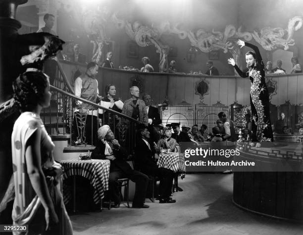 Anna May Wong formerly Wong Liu Tsong, the Chinese-American actress is performing in a night club in a scene from 'Limehouse Blues'. Title: Limehouse...