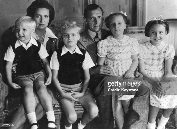 The Spanish pretender to the throne, Juan de Bourbon , son of Alfonso XIII, with his wife, Princess Maria Mercedes and their four children, Juan...