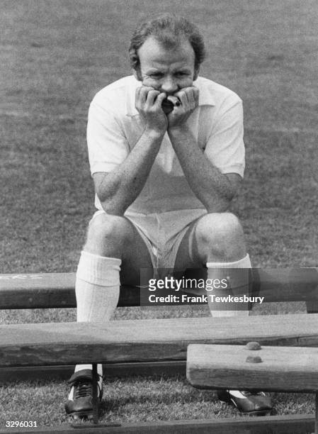 Leeds United football player Billy Bremner takes a break from training at Elland Road.
