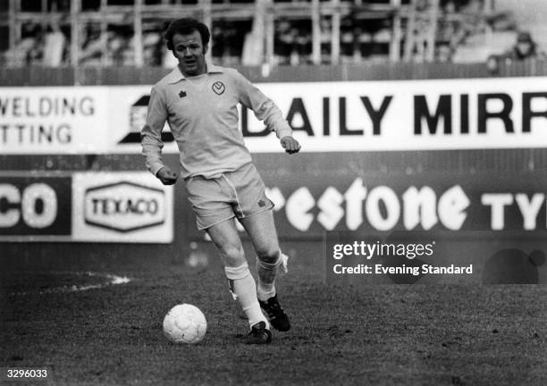 Leeds United football player, Billy Bremner , in action on the football pitch.