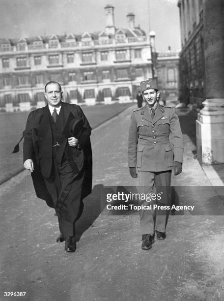 King Peter of Yugoslavia and his Master, H. Thinkhill, take a walk in Clare College, Cambridge.