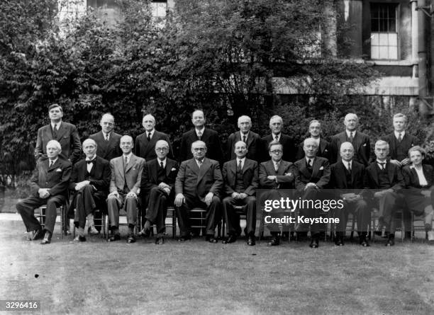 Prime Minister and Labour Party leader, Clement Attlee , in the garden of No 10 Downing Street, with his new cabinet, London, August 1945. Front row,...