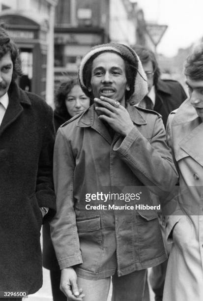 Jamaican singer-songwriter and reggae star Bob Marley outside Marylebone Magistrates Court in London, where he was fined for possession of cannabis.