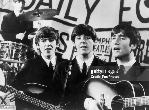 Top British pop group The Beatles in performance, from left to right; Ringo Starr, George Harrison , Paul McCartney and John Lennon .