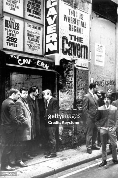 Music fans waiting outside the famous Cavern Club music venue in Liverpool, where The Beatles had a residency in the early 1960's.