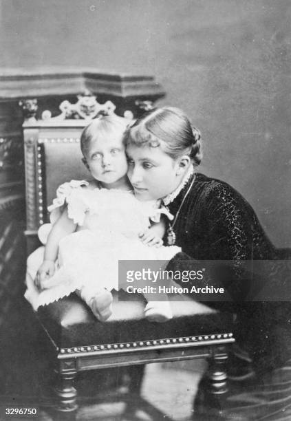Princess Charlotte, daughter of Friedrich III, King of Prussia, , wife of Duke Bernhard of Saxe-Meiningen, with their child.