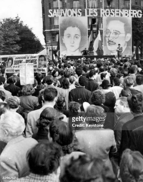 Demonstration in Paris, attended by thousands, calling for the pardon of US communists Julius, , and Ethel Rosenberg, , convicted of passing atomic...