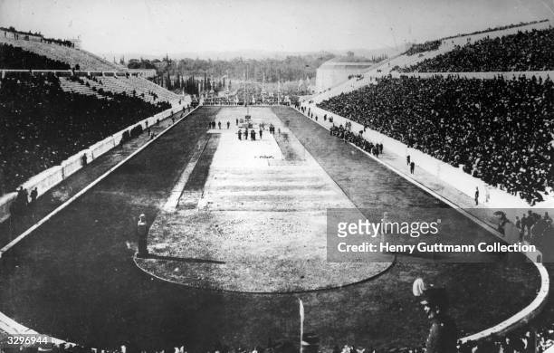 Spectators at the Olympic stadium in Athens, for the 1896 Games. The first modern Olympics initiated by Pierre de Coubertin who was inspired by the...