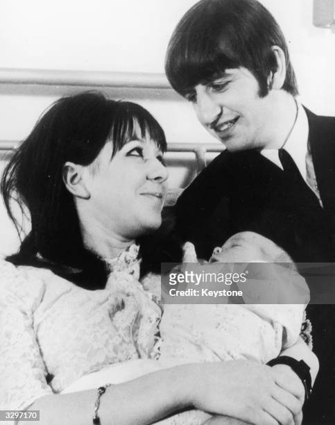 Ringo Starr, drummer with the pop group The Beatles, with his 19-year-old wife Maureen and their new baby son Zak, at Queen Charlotte's Maternity...