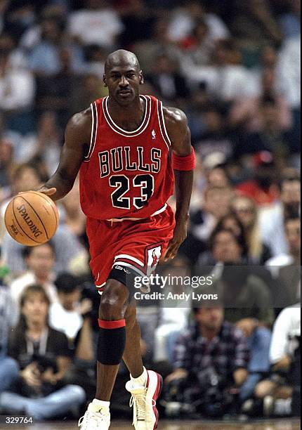 Guard Michael Jordan of the Chicago Bulls in action against the Miami Heat during a game at the Miami Arena in Miami, Florida. The Heat defeated the...