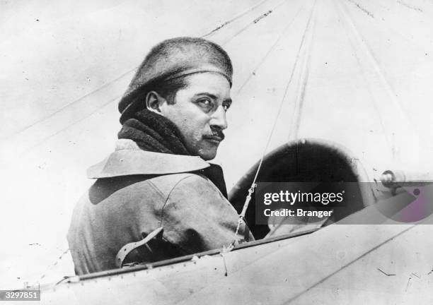 French aviator Roland Garros in the cockpit of an aircraft.