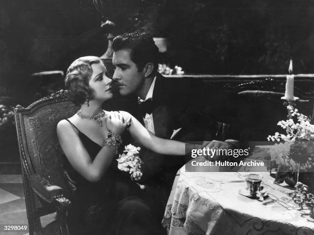 British actress Evelyn Laye with John Boles in a scene from the film 'One Heavenly Night' , directed by George Fitzmaurice for Samuel Goldwyn.