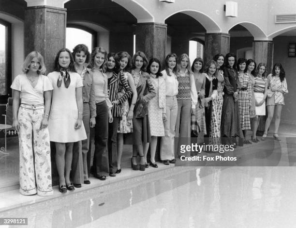 Line of young girls selected to model for the 'Debutante's Dress Show' held at the Berkeley Hotel, London.