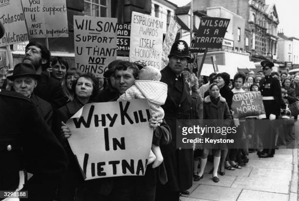 Anti-Vietnam War protesters with banners outside Essex University.