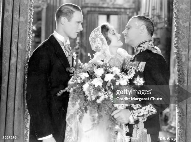 Mary Astor, the screen name of Lucille Langehanke, the American leading lady, is kissing Lowell Sherman , the American leading man, who was also...