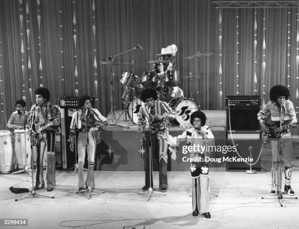 Motown pop group the Jackson Five, featuring brothers Michael, Jermaine, Marlon, Tito and Jackie, performing at the London Palladium.