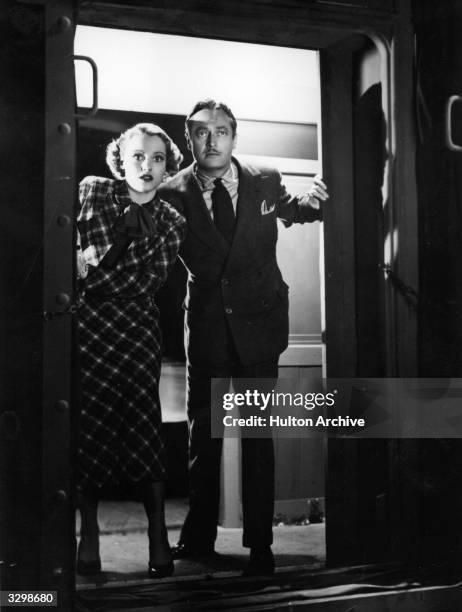 Edmund Lowe and Constance Cummings in a tense scene from the film 'Seven Sinners'. Title: Seven Sinners US Title: Doomed Cargo Studio: Gaumont...