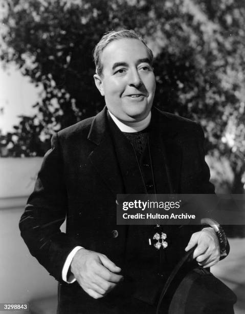 American actor Walter Connolly plays the lead role in the eccentric comedy 'Father Brown, Detective', based on the exploits of G K Chesterton's...