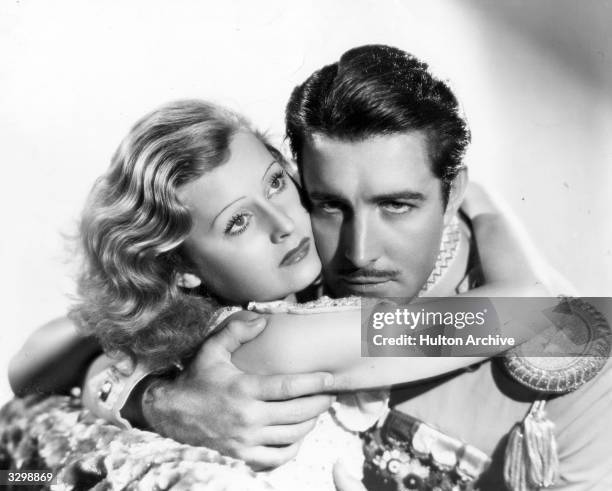 John Boles and Lilian Harvey cling to each other in a scene from the film 'My Lips Betray'. Title: My Lips Betray Studio: TCF Director: John G...