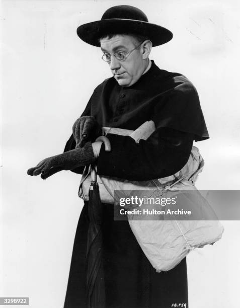 British actor Alec Guinness plays the crime-busting priest in the eccentric comedy based on G K Chesterton's 'Father Brown' series. Titled 'The...