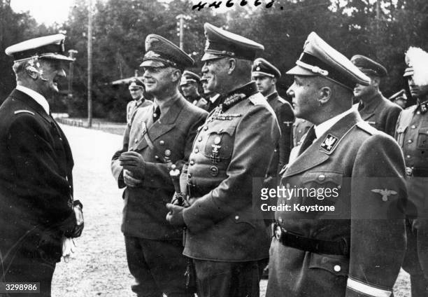 Admiral Miklos Horthy of Hungary, with General Joachim von Ribbentrop , Field Marshal Wilhelm Keitel and Rudolf Hess' successor Martin Bormann at...