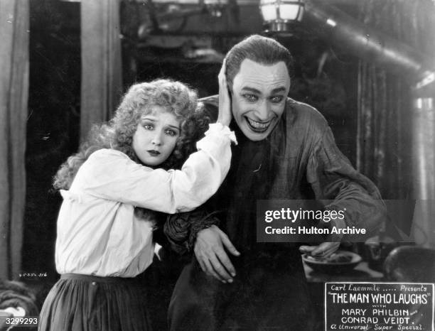 Mary Philbin with Conrad Veidt in a scene from the film 'The Man Who Laughs', directed by Paul Leni for Universal.