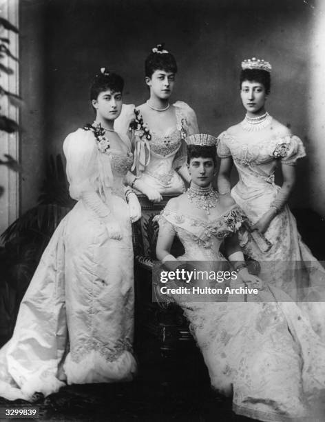 Queen Alexandra with her three daughters Louise, Princess Royal, , Victoria and Maud.