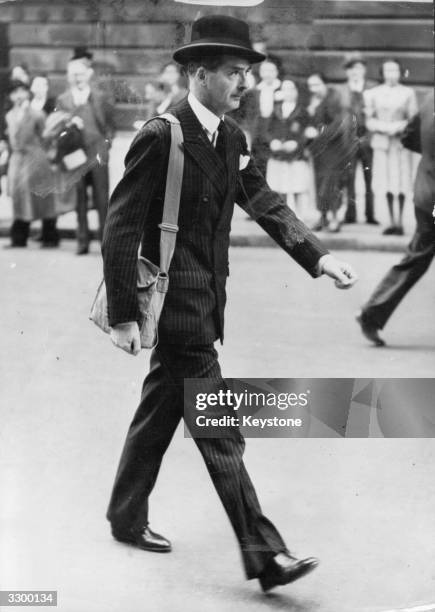 British Statesman and Dominions Secretary Anthony Eden on his way to 10 Downing Street, with a gas-mask over his shoulder, at the outbreak of war.