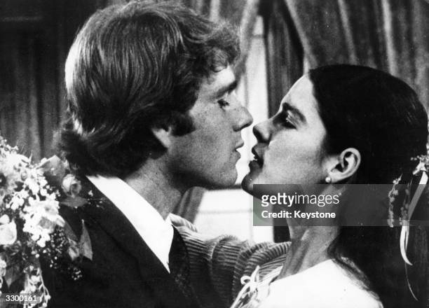 Ali MacGraw and Ryan O'Neal in a loving embrace in a scene from the film 'Love Story', which was voted 'Film of the Year' in 1971 having outrun even...