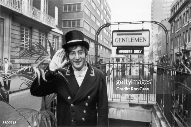 British rock musician and member of The Beatles, John Lennon , dressed as a Public Lavatory Commissionaire during the filming of the 'Not Only...But...