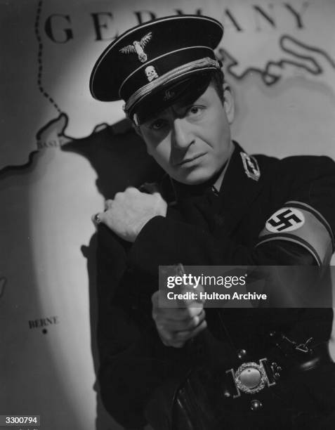 Austrian actor Paul Henreid plays a Gestapo officer in the 20th Century Fox film 'Gestapo', aka 'Night Train to Munich', directed by Carol Reed.