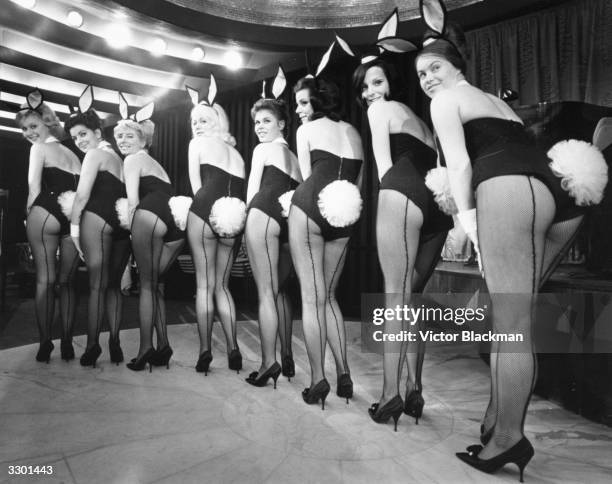 Line of Playboy-style 'bunny girls' at Paul Raymond's Bal Tabarin nightclub in Hanover Square, London, 11th February 1963.