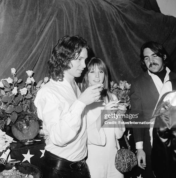 Jim Morrison & Pamela Courson At The Warner Playhouse Jim Morrison & Pamela Courson At The Warner Playhouse