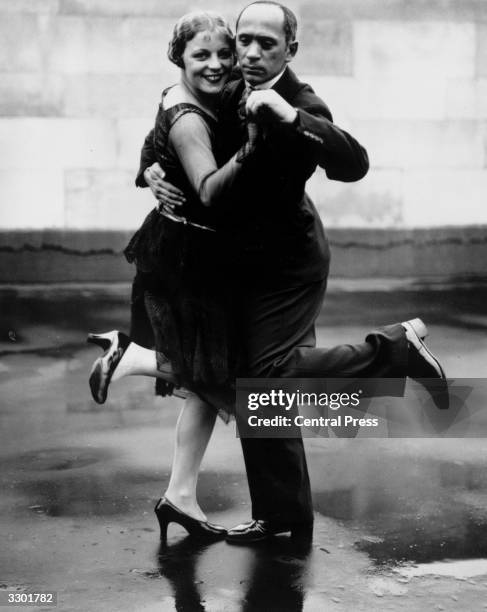 Santos Casami and Jose Lennard dancing the Charleston.