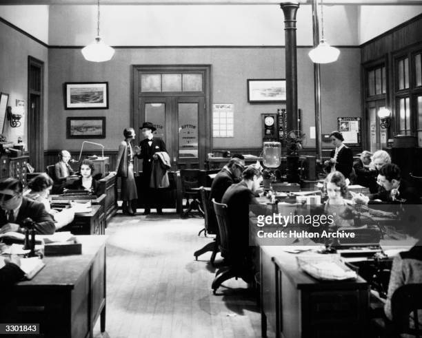 Actors Mary Astor and Charles Sellon in a scene from the RKO film 'Behind Office Doors'.