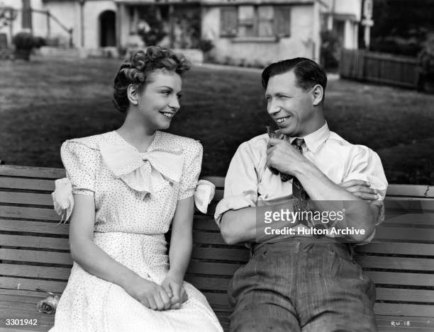 British comedian George Formby stars with Rosalyn Boulter in the Columbia comedy 'George In Civvy Street', directed by Marcel Varnel.