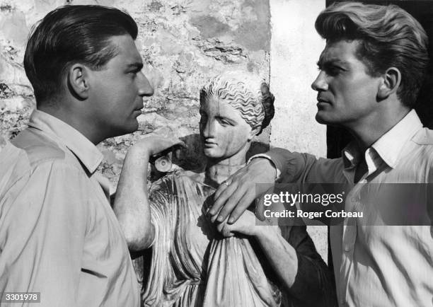 Francois Perier and Jean Marais in a confrontational scene from the film 'Orphee', in which the Princess of Death falls in love with Orpheus - a...