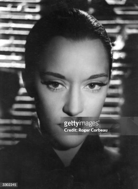 Spanish actress Maria Casares stars as the Princess of Death in the surreal romance 'Orphee' . The film was directed by Jean Cocteau for Films du...