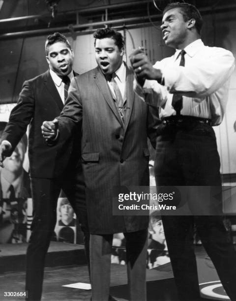 Ronald, Rudolph and O'Kelly; gospel influenced pop vocal group The Isley Brothers, performing on the British television show 'Ready Steady Go'.
