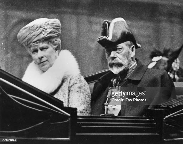 Close-up of King George V and Queen Mary in a carriage on their way to the Knights of St John Ceremony at Westminster Abbey.