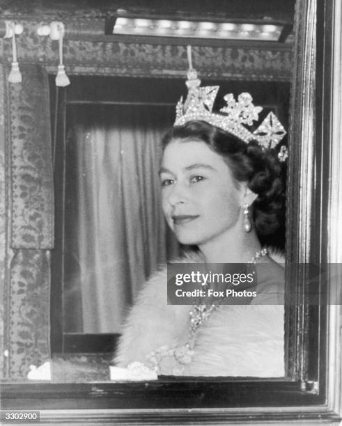 Queen Elizabeth II en route to the first State Opening of Parliament under her reign.