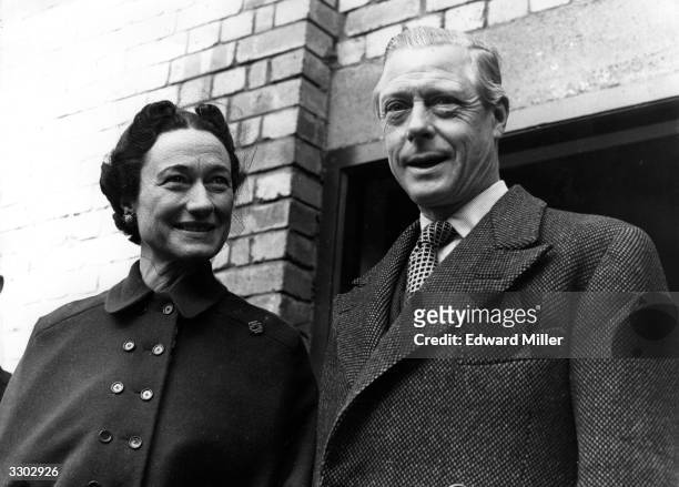 The Duke of Windsor meets the Duchess of Windsor off the train at Victoria Station, London where she arrived from Paris.